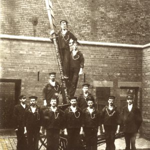 Police Firemen wearing their new Sailors uniform in the Cobbled Yard