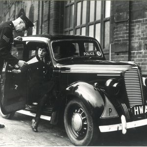 Police officers outside this building during WWII